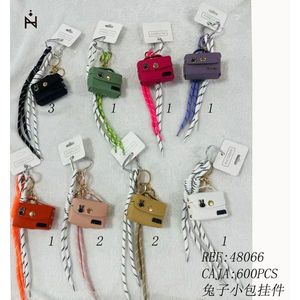 Portachiavi con ciondolo a forma di coniglio, mini borsa, accessorio di moda per donne e ragazze - Product Image 1