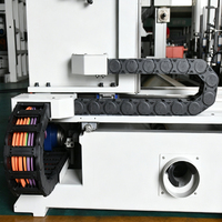 Machine à tenonner CNC double extrémité JR-2518 de la marque JUNRAN pour le travail du bois, idéale pour la production de chaises en bois massif sur ligne de fabrication de meubles.