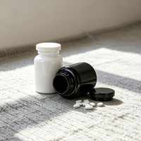 Flacon en plastique PET noir et blanc vide pour pilules, comprimés, capsules, emballage de compléments alimentaires et de vitamines avec couvercle à vis