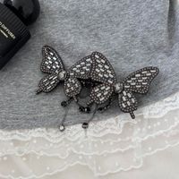 Accessoires de cheveux de luxe pleine pince à cheveux papillon en strass pour filles poignées de cheveux en croûte scintillantes pince à frange décorative