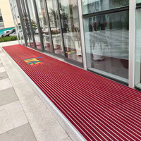 Tapis d'entrée mince d'isolation phonique de support en caoutchouc d'alliage d'aluminium de modèle géométrique antidérapant de style moderne pour l'usage à la maison commercial