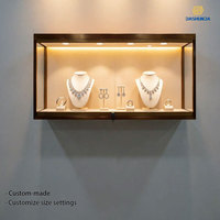 Vitrine murale en verre doré avec éclairage LED, présentoir transparent pour bijoux, étagère murale intégrée pour figurines, petite taille