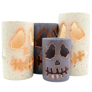 Custom Halloween decor tea light holder ceramic hollowed-out Jack o lantern lol face tea light candle lantern with inner base