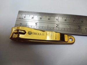 Cortauñas Profesional Obexa de Acero Inoxidable Quirúrgico con Acabado Espejo Dorado, Pequeño Cortador de Cutículas Plegable para Uñas - Product Image 4