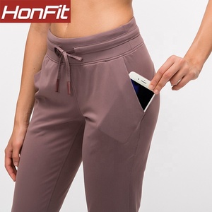 OEM Plain Sportswear New Jogger Pants Yoga Cordón Gimnasio Running Leggings con bolsillo - Product Image 5