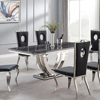Ensemble de table à manger rectangulaire contemporaine Fanaosi 6 places avec chaises, pieds en acier inoxydable et plateau en marbre pour la maison ou la villa