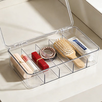 Boîte de rangement en plastique transparente à cinq compartiments sur mesure, boîte de rangement moderne minimaliste pour le soin de la peau et les fards à paupières sur le bureau