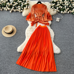 Set Casual da donna tunica con scollo a V Top e vita alta gonne a pieghe 3D Set abbigliamento americano all'ingrosso - Product Image 4