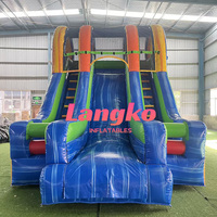 Structure de jeu gonflable double toboggan aquatique/sèche pour événements festifs en extérieur