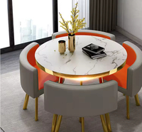 Ensemble de table à manger moderne en MDF avec 4 chaises couleur marbre pour salon, cuisine, hôtel ou réunion Matériau en bois pour villas