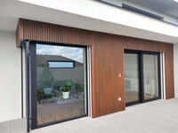 Panel de Pared WPC Moderno, Muestras Gratis, Revestimiento de PVC para Decoración Exterior, Laminado, Ignífugo, Insonorizante, Alternativa a la Madera