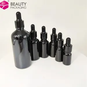 Wholesale 2022 Premium Serum Oil Packaging Matte Black White 1oz 30ml 50ml 60ml 100ml Black Essential Oil Glass Dropper Bottles