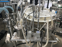 Machine de remplissage automatique de parfum par pulvérisation sous vide rotative pour cosmétiques et bouteilles