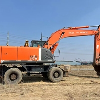 Excavatrice sur pneus Hitachi ZX210W-3 d'origine japonaise, moteur Isuzu Common Rail, modèle 2021, poids opérationnel de 20,8 tonnes, 122 kW, 0,91 m