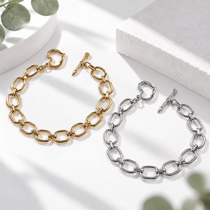 Pulsera de Eslabones Ovalados Abiertos de Acero Inoxidable con Baño de Oro de 14K y Variaciones en Tonos Dorado y Plateado - Product Image 1