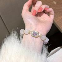 Bracelet élégant et tendance pour femme, perles roses et breloque fleur en cristal, qualité supérieure, directement de l'usine, pour usage quotidien