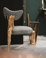 Chaise de salle à manger de luxe avec base en laiton au design artistique haut de gamme, fauteuil en tissu texturé, chaises d'appoint pour la maison et les restaurants de luxe