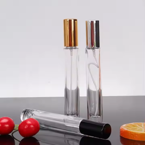 Botella de Vidrio Transparente Redonda de Lujo de 1/3 oz (10 ml) con Base Pesada y Tapa Atomizadora Dorada, Plateada o Negra para Aceite de Perfume - Product Image 5