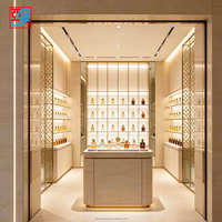 Vitrine murale LED de luxe moderne pour parfumerie, personnalisable, vente en gros