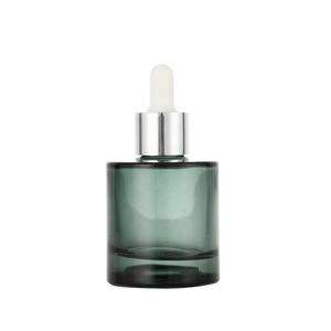 Botella de aceite esencial de vidrio teñido verde con cuentagotas plateado Botella cosmética protectora UV para aceites sensibles para el cuidado de la piel - Product Image 2