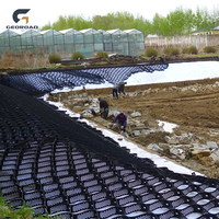 Système de confinement cellulaire Georoad en HDPE, résistant aux séismes, avec joints dissipateurs d'énergie, adapté aux tremblements de terre, minimisant les dommages