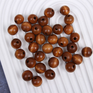 Bola de madera unisex producida en fábrica con joya de cuero para niños de color y agujero - Product Image 1