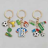 Nuevo Colgante de Recuerdo 2026 de Moda con Temática de Fútbol, de Aleación de Zinc, Impresión Tipográfica, Forma Irregular, Personalización Sencilla