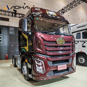 Camions tracteurs lourds FAW économiques, conception personnalisée, avec une puissance élevée, <span class=keywords><strong>prix</strong></span> du tracteur tête de <span class=keywords><strong>camion</strong></span> - Product Image 1