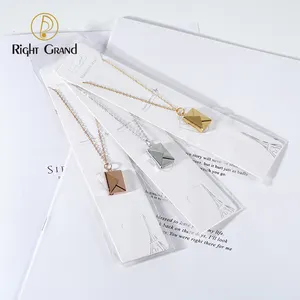 Gioielli per Coppia Regali di San Valentino Medaglione Apribile a Busta Placcato Oro in Acciaio Inossidabile con Fessure per Messaggi d'Amore - Product Image 3