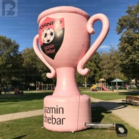 Trophée publicitaire gonflable géant de 5 m avec logo personnalisé rose lumineux pour compétition sportive/activation de marque