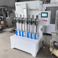 Petite machine de remplissage semi-automatique par gravité pour bouteilles de détergent chimique liquide en plastique de 1000 ml