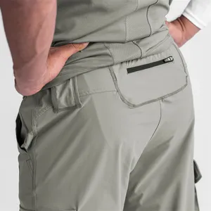 Yüksek kalite özel Logo Slim Fit spor atletik boş kargo spor rahat naylon erkekler Joggers pantolon fermuarlı cepler