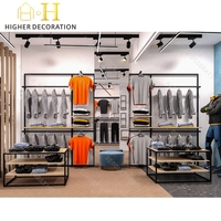 Conception d'intérieur de magasin unique et professionnelle pour les magasins de vêtements pour hommes, décoration de magasins de vêtements et de chaussures pour hommes, designs pour les boutiques de vente au détail
