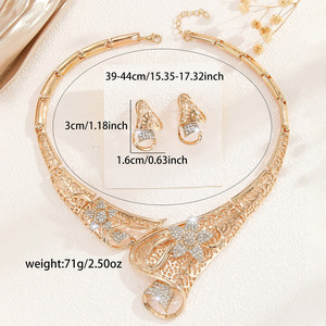 Europe and the United States hot gold zinc alloy inlaid <b>white</b> rhinestone hollow flower necklace earrings set women's jewelry - Product Image 3