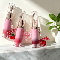 Huile repulpante hydratante OEM en gros avec applicateur métallique rafraîchissant, saveur fruitée, huile magique pour les lèvres, maquillage végétalien, gloss teinté