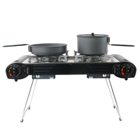 Haute qualité Portable Double brûleur à gaz Butane cuisinière Mini fonte Camping table de cuisson pour une utilisation en voiture Offre Spéciale cuisinière à gaz Portable