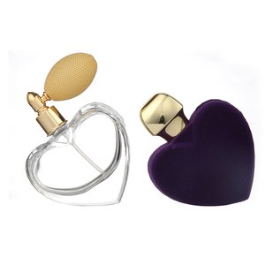 Botellas de perfume de cristal en forma de corazón transparentes al por mayor de los nuevos diseños 75ml con la bomba de aire - Product Image 6