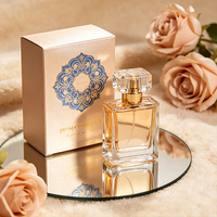 Boîte à parfum pliante de luxe OEM bleu or, motif floral orné en feuille d'or, emballage personnalisé avec logo de marque pour parfum 50 ml