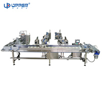 Nouvelle machine à emballer automatique de caisse de carton de robot à grande vitesse pour des biscuits de tarte au chocolat de pain de gingembre de biscuit pour des hôtels et des industries des produits de base