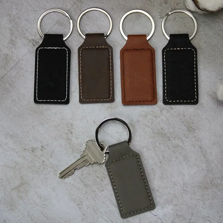 سلسلة مفاتيح جلدي قابلة للتغير مربعة الشكل بيضاوية مع شعار مخصص وملونة سلسلة مفاتيح من الجلد الصناعي العادي