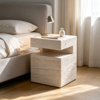 Table basse moderne minimaliste en marbre avec un design unique en pierre naturelle, pièce maîtresse de luxe pour salon