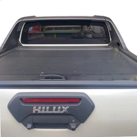 Cubierta de lona enrollable retráctil rígida de aleación de aluminio de alta calidad para camioneta Toyota Hilux Travo Revo Vigo