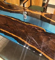 Table de salle à manger en résine époxy en bois d'ébène moderne à prix d'usine Table en bois massif d'ébène de qualité supérieure et dalle en résine époxy bleue