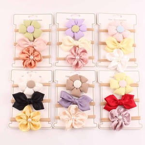 Juego de 3 diademas de nailon para bebé de 0 a 3 años, con lazo de flores, paquete de tarjetas OPP, accesorios para el cabello para niñas pequeñas - Product Image 1