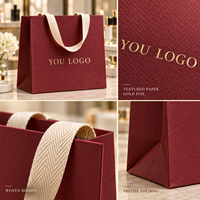 Sacs en papier de luxe personnalisés avec logo OEM ODM de haute qualité, 250 g, pour vêtements et emballages cadeaux