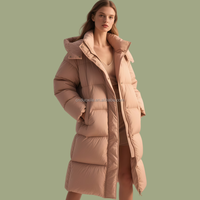 Manteau matelassé pour femme en duvet de canard blanc 90% ODM, avec blocs de couleur personnalisés OEM, long, à capuche, pour l'hiver, de créateur, fabrication usine
