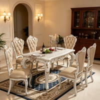 Ensemble de table à manger en marbre européen, chaises en bois massif sculptées à la main, revêtement en cuir capitonné, meubles de salle à manger de luxe pour villa