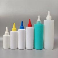 Fabrication Bouteille d'emballage d'huile à cheveux ronde personnalisée en PEHD de 60ml Bouteille à presser avec bouchon à embout de 100ml Bouteilles en plastique de 150ml