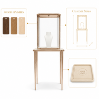 Vitrine à bijoux sur mesure en or rose avec vitrine en verre pour boutique de bijoux de marque, distributeur et design d'intérieur