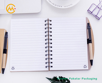 Vente en gros OEM mini carnet de notes en papier kraft à spirale personnalisé et écologique avec porte-stylo